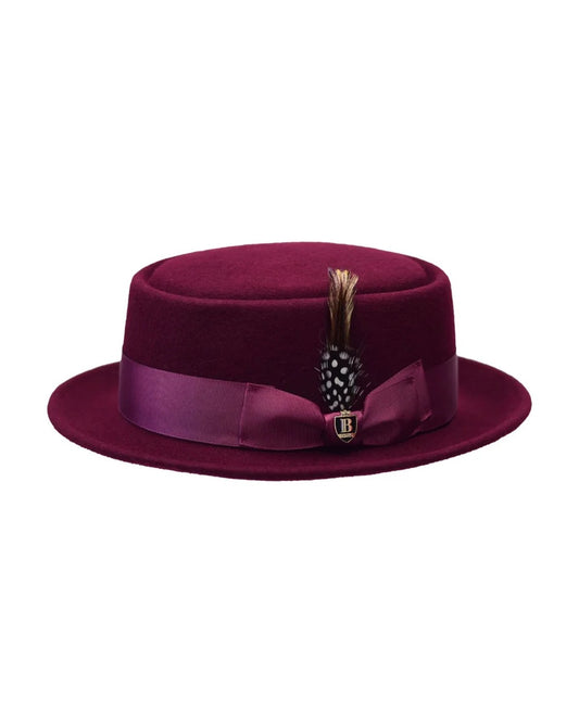 Men's burgundy wool felt pork pie hat with feather and grosgrain band – product photo